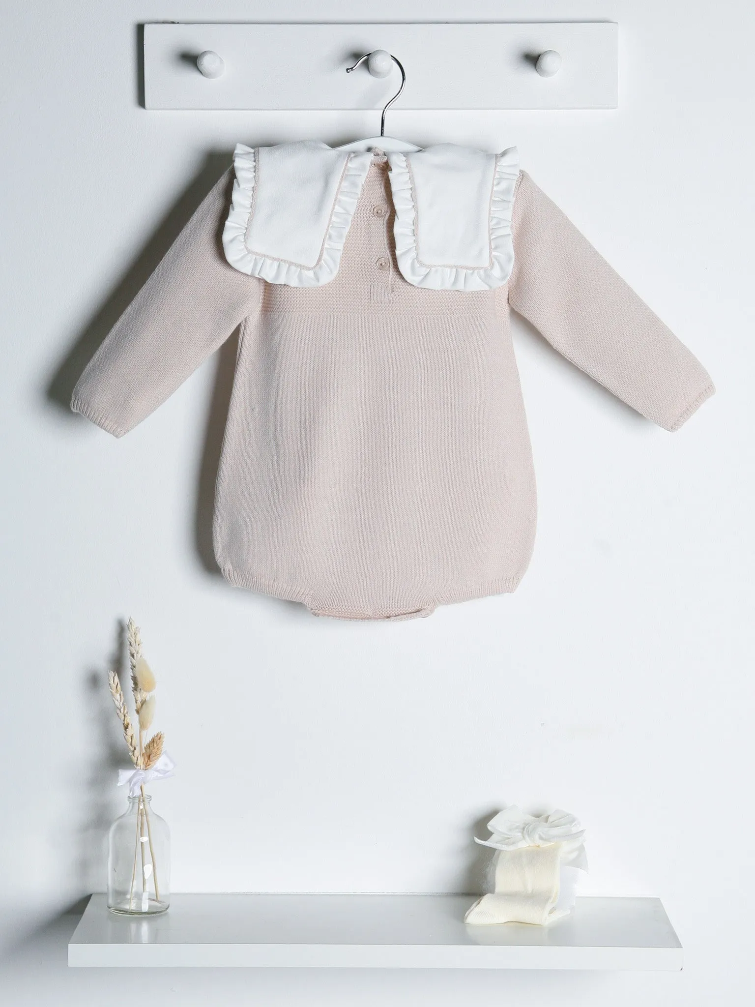 Baby Mabel beige knitted romper with bib collar