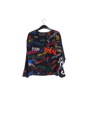 Black silk top with colorful tekst print