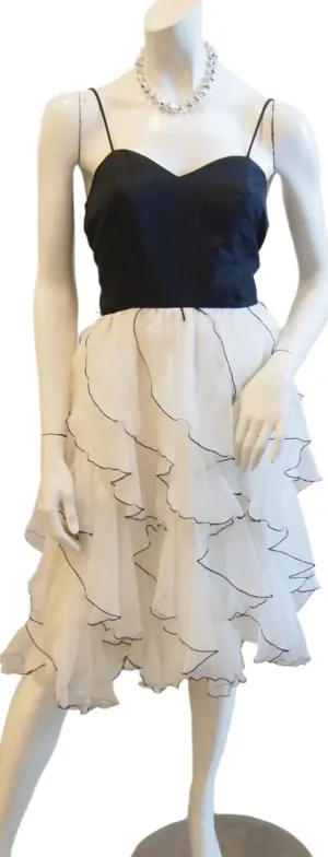 Black with white ruffles and black trimming skirt