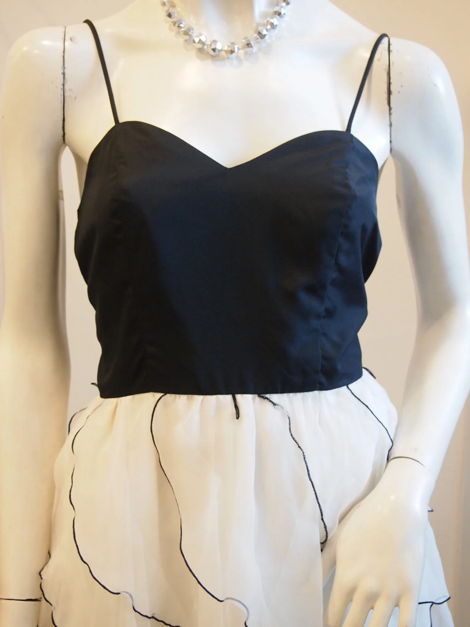 Black with white ruffles and black trimming skirt