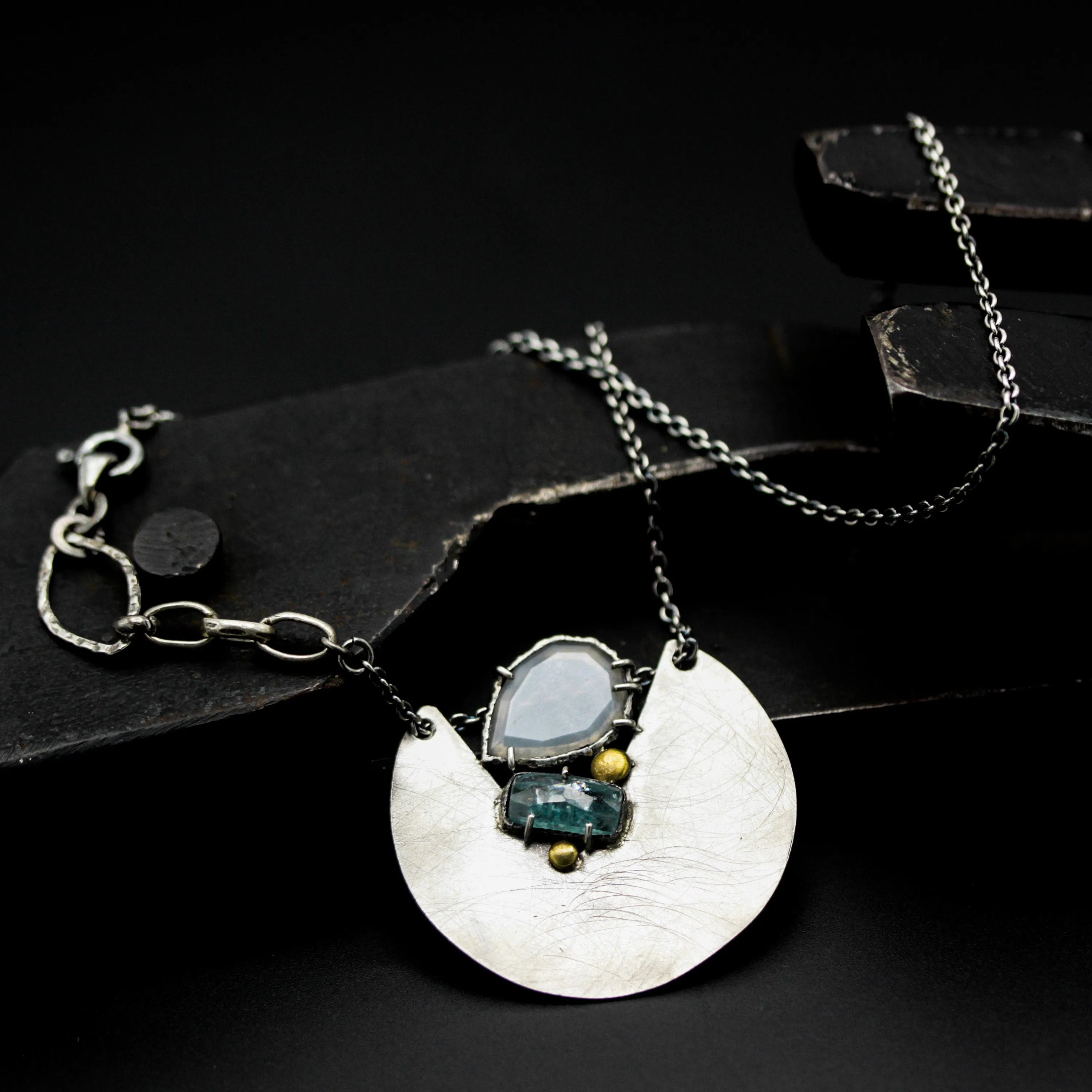 Sterling silver circle shape pendant necklace with blue kyanite and white moonstone on sterling silver chain